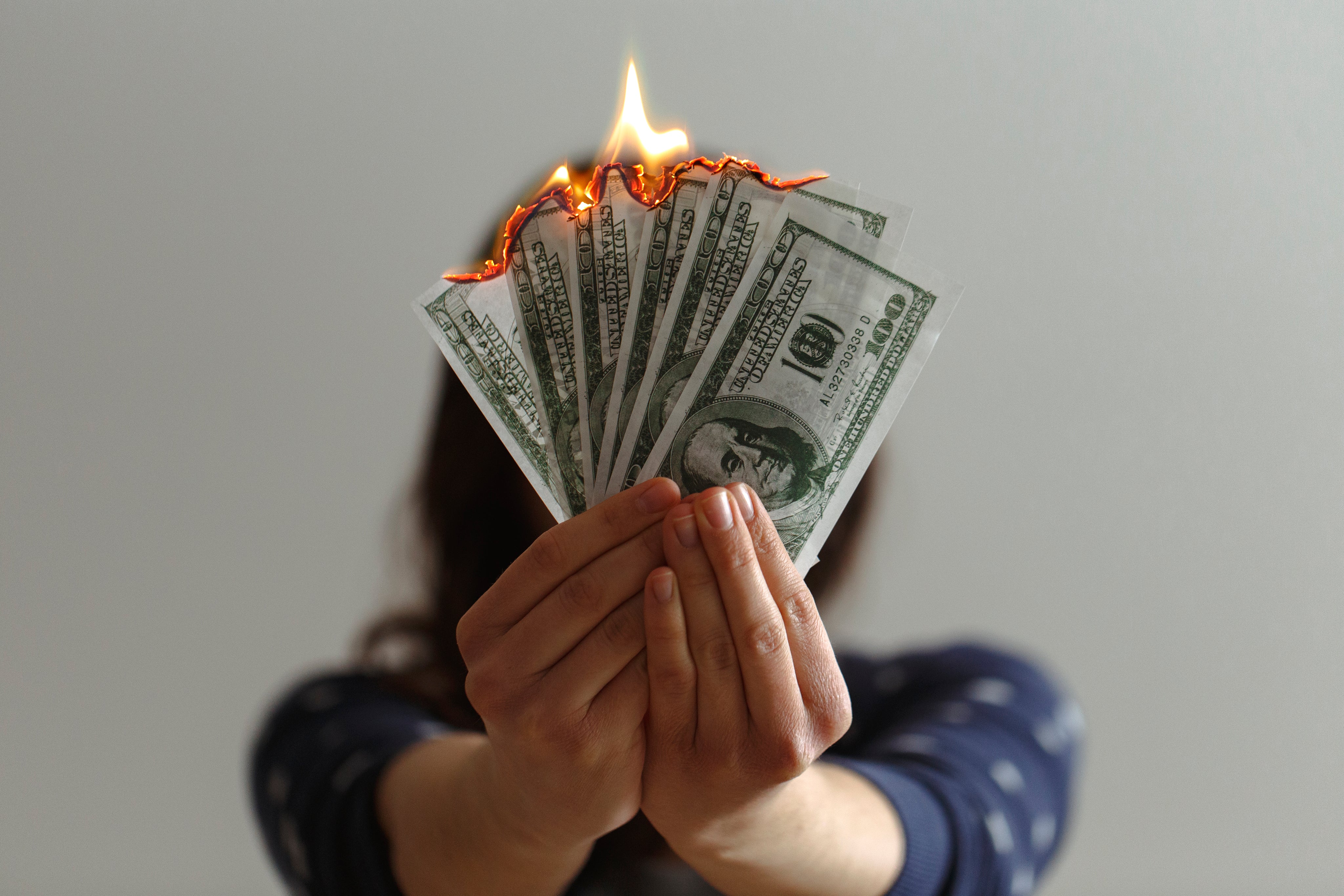 files/hands-holding-money-aflame.jpg files/hands-holding-money-aflame.jpg